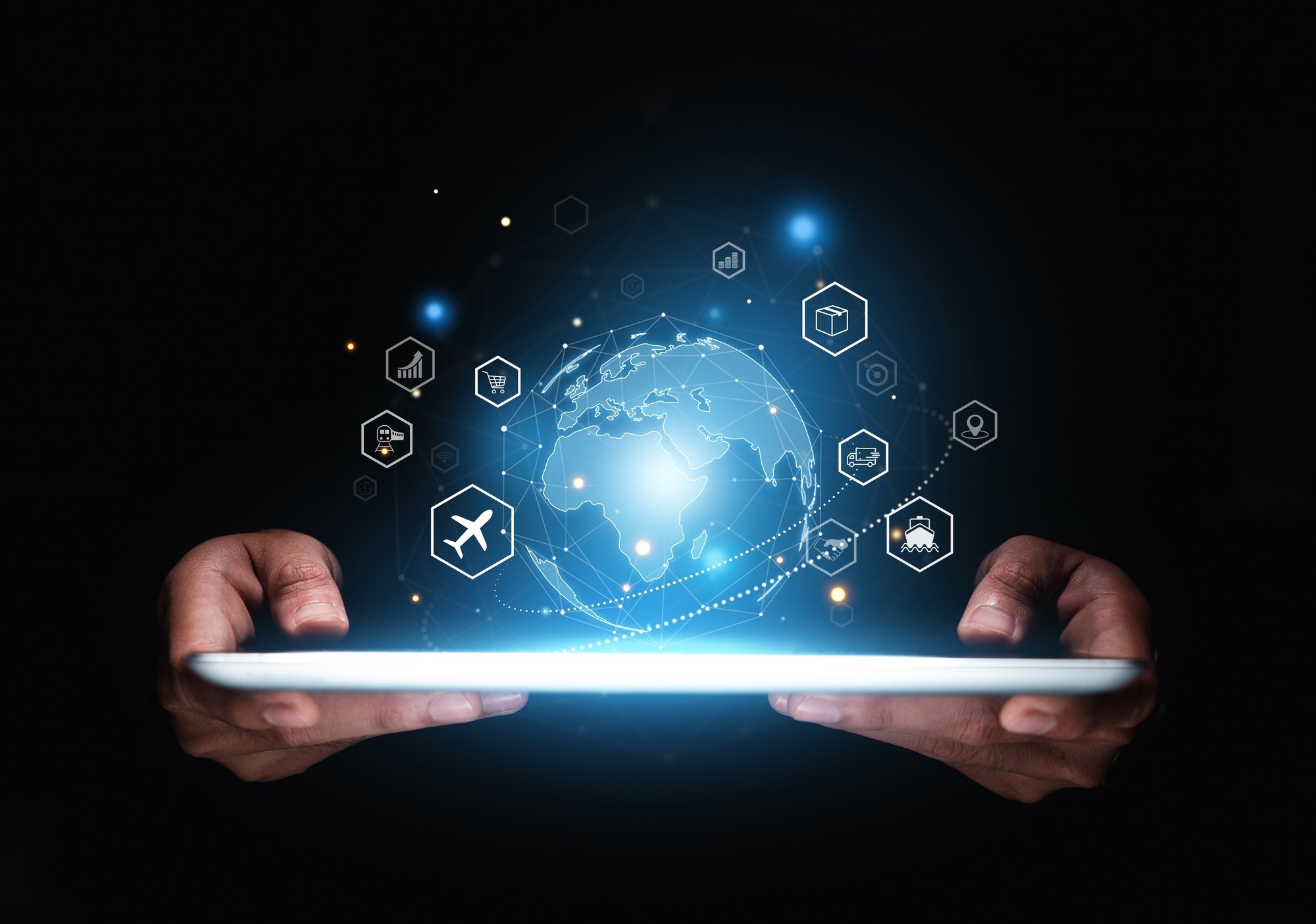 Hand of businessman showing global logistics network on tablet, Futuristic innovation, Smart transport technology concept.